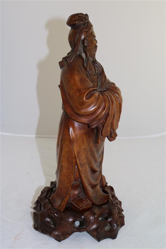 A Chinese rosewood figure of Lu Dongbin, early 20th century, total height 24cm